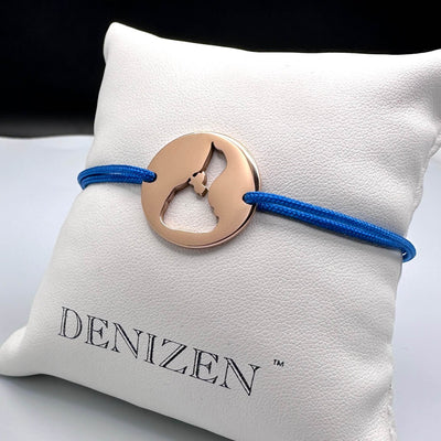 DENIZEN bracelet of Block Island cutout in rose gold and blue string