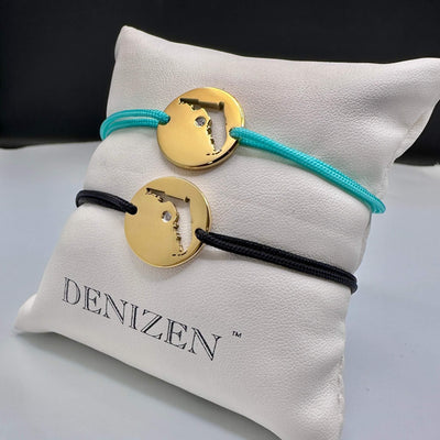 DENIZEN bracelets of Florida map in gold on black or turquoise string