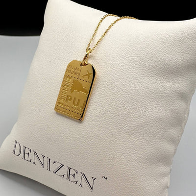DENIZEN gold luggage tag pendant of Punta Cana