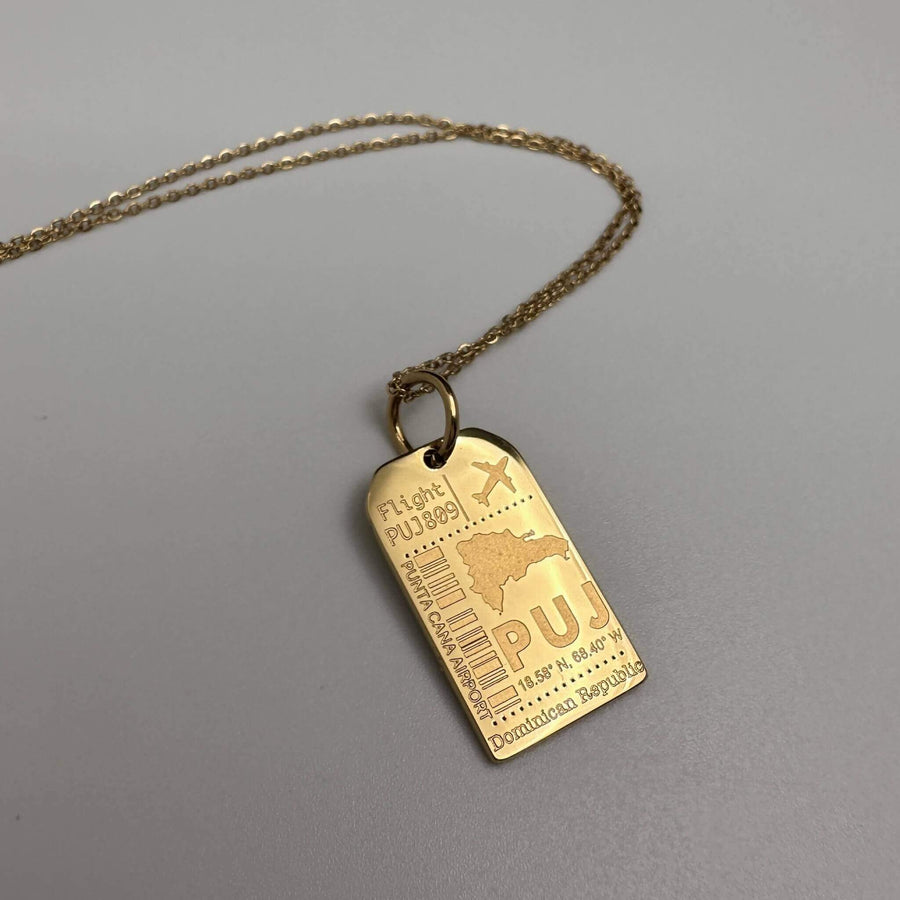 DENIZEN gold luggage tag charm of Punta Cana