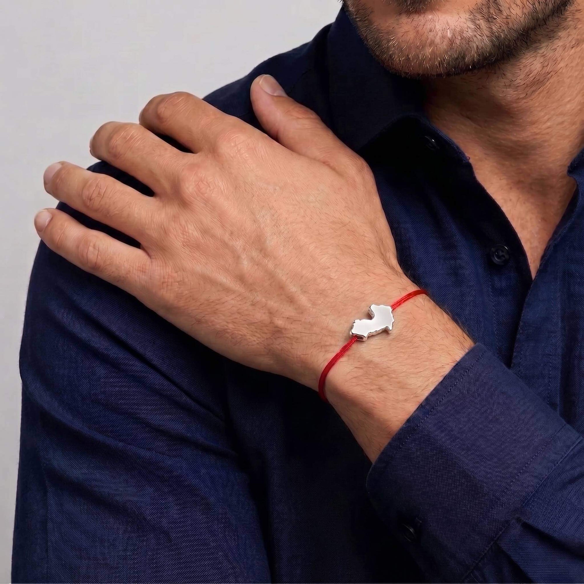 DENIZEN bracelet Saint-Tropez charm silver on red string man