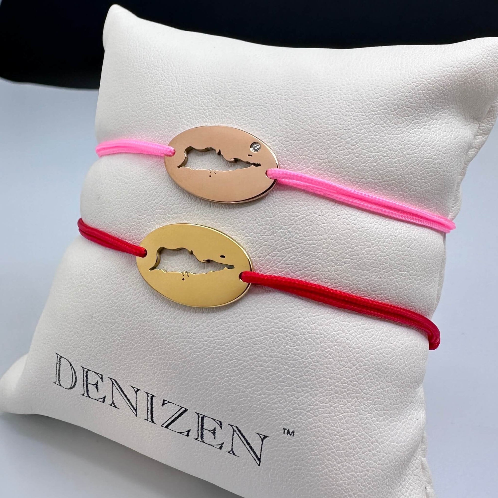 DENIZEN bracelets of St Croix map in gold and rose gold with pink and red strings