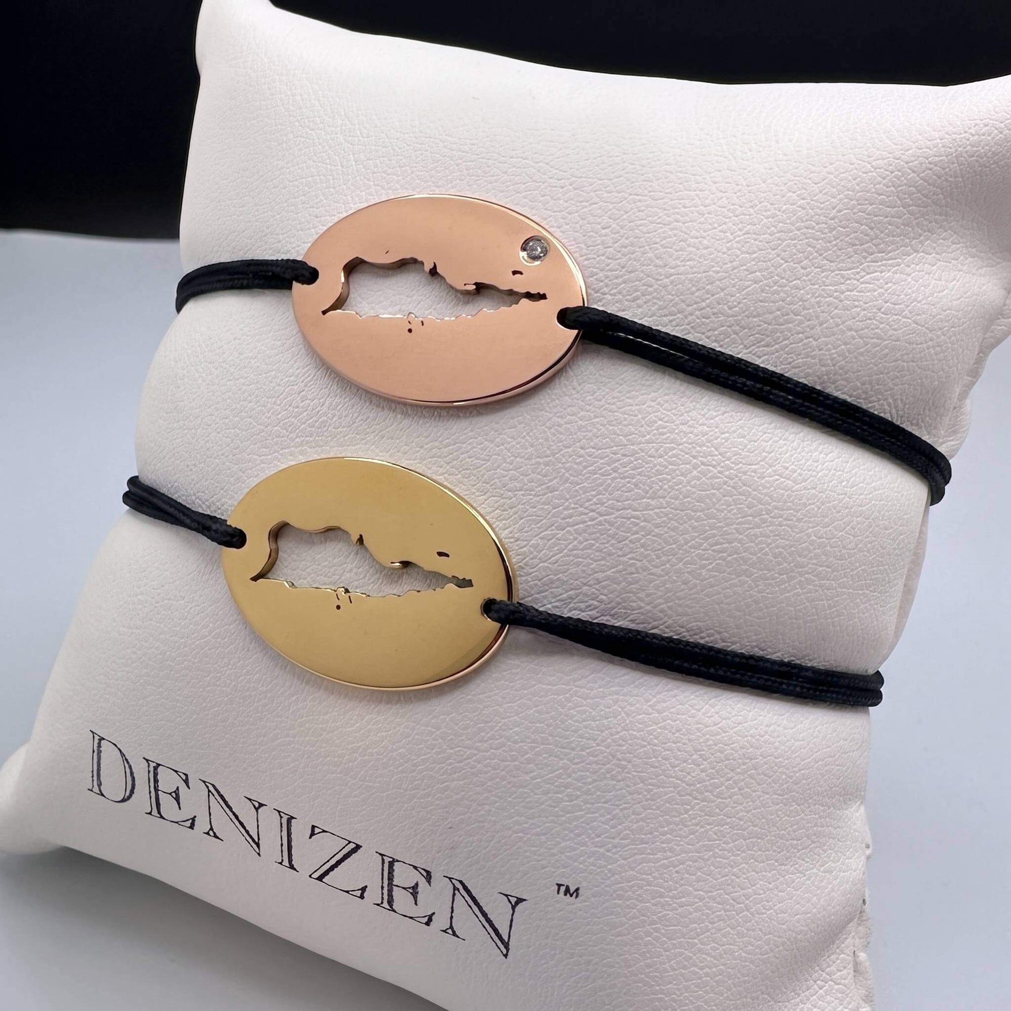 DENIZEN bracelets of St Croix map in gold and rose gold with black strings
