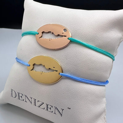 DENIZEN bracelets of St Croix map in gold and rose gold with blue and turquoise strings