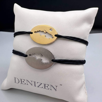 DENIZEN bracelets of St Thomas USVI map in gold and brushed steel with black strings