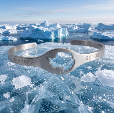DENIZEN cuff with Antarctica map and coordinates in brushed silver