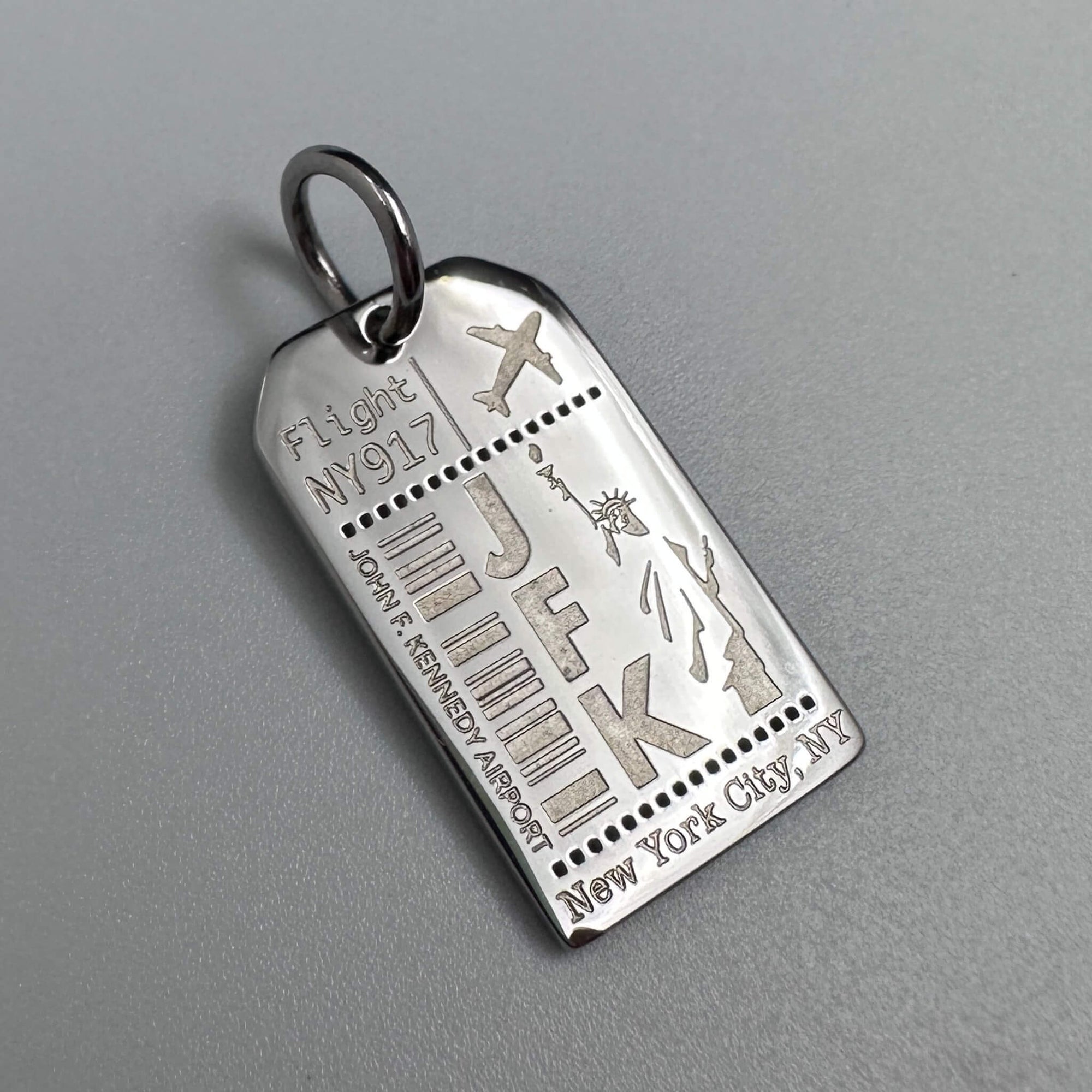 DENIZEN luggae tag charm JFK NYC silver