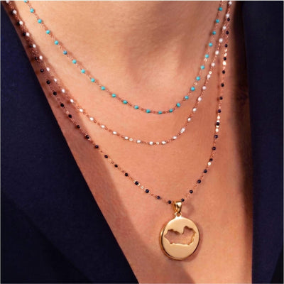 DENIZEN necklace Saint-Tropez map cutout gold black rosary chain woman